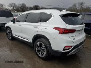 ✅ 2019 Hyundai Santa Fe Ultimate • VIN: 5NMS5CAA4KH021309 • Лот: 36098413. Опубликован ранее на Copart с пробегом 76 221 миль. Бесплатный доступ к архиву аукционных продаж из США и подробный отчёт об истории автомобиля на DreamBid. Изображение 2.