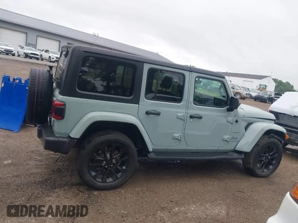 ✅ 2023 Jeep Wrangler Sahara • VIN: 1C4JJXP67PW604835 • Lot: 42431648. Listed on IAAI with 15,209 mi. Free auction sales archive from the USA and detailed vehicle history report at DreamBid. Image 13.
