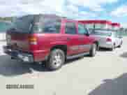 2002 Chevrolet Tahoe LT with VIN 1GNEK13Z82J174824, listed as a IAAI auction lot 43395942 with 239,860 mi miles and . Bid and sale history available at DreamBid. Image 4.