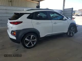✅ 2021 Hyundai Kona Limited • VIN: KM8K3CA58MU750171 • Лот: 72286094. Опубликован ранее на Copart с пробегом 119 072 миль. Бесплатный доступ к архиву аукционных продаж из США и подробный отчёт об истории автомобиля на DreamBid. Изображение 3.