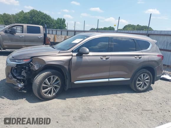 ✅ 2020 Hyundai Santa Fe SEL • VIN: 5NMS33AD3LH261307 • Lot: 42940601. Listed on IAAI with 95,444 mi. Free auction sales archive from the USA and detailed vehicle history report at DreamBid. Image 14.