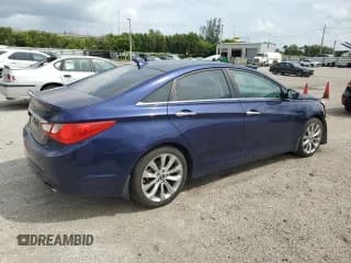 ✅ 2013 Hyundai Sonata SE • VIN: 5NPEC4AC8DH643248 • Lot: 73526034. Listed on Copart with 99,415 mi. Free auction sales archive from the USA and detailed vehicle history report at DreamBid. Image 3.