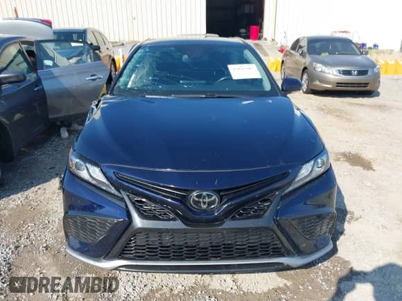 2021 Toyota Camry XSE with VIN 4T1K61AK4MU615383, listed as a IAAI auction lot 43193305 with 57,706 mi miles and . Bid and sale history available at DreamBid. Image 12.