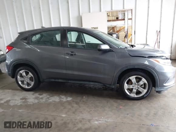 ✅ 2019 Honda HR-V LX • VIN: 3CZRU5H31KG701579 • Lot: 43312842. Wystawiony na IAAI z przebiegiem Nie podano. Bezpłatny archiwum sprzedaży aukcyjnych z USA i szczegółowy raport historii pojazdu na DreamBid. Zdjęcie 13.