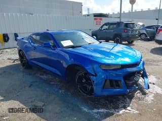 2016 Chevrolet Camaro 1LT z VIN 1G1FA1RX1G0176328, wystawiony jako IAAI lot #42568275 z przebiegiem 109 641 mil mil oraz . Historia ofert i sprzedaży dostępna na DreamBid. Obrazek 1.