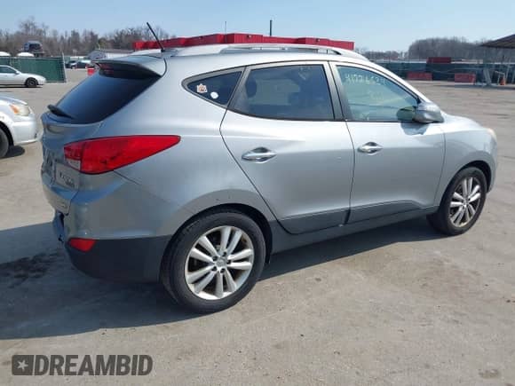 2010 Hyundai Tucson GLS with VIN KM8JUCAC2AU078658, listed as a IAAI auction lot 41726534 with 140,155 mi miles and . Bid and sale history available at DreamBid. Image 4.