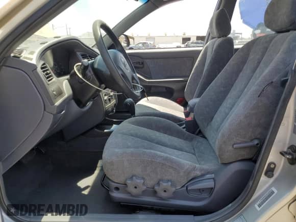 2002 Hyundai Elantra GLS z VIN KMHDN45DX2U429546, wystawiony jako Copart lot #66802244 z przebiegiem 103 724 mil mil oraz Czysty tytuł • Clean title. Historia ofert i sprzedaży dostępna na DreamBid. Obrazek 7.