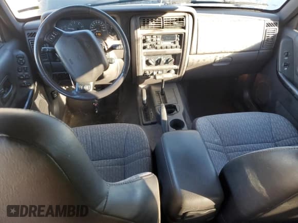 ✅ 2001 Jeep Cherokee Sport • VIN: 1J4FF48S21L567522 • Lot: 87275805. Listed on Copart with 278,075 mi. Free auction sales archive from the USA and detailed vehicle history report at DreamBid. Image 8.
