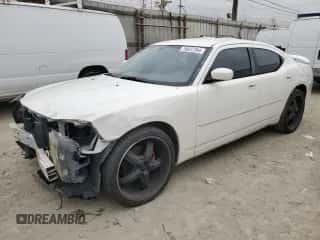 2010 Dodge Charger SXT с VIN 2B3CA3CV0AH244507, выставлен на аукционе Copart как лот 76627764 с пробегом 128 002 миль миль и Чистый • Clean title. История ставок и продаж доступна на DreamBid. Изображение 1.
