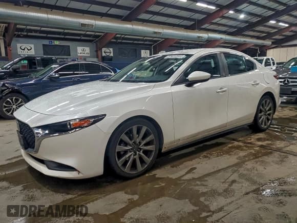 ✅ 2021 Mazda 3 Select • VIN: JM1BPABLXM1339611 • Lot: 95399455. Listed on Copart with 120,691 mi. Free auction sales archive from the USA and detailed vehicle history report at DreamBid. Image 1.