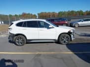 ✅ 2018 BMW X1 xDrive28i • VIN: WBXHT3C38J3H30018 • Lot: 43694942. Listed on IAAI with 50,899 mi. Free auction sales archive from the USA and detailed vehicle history report at DreamBid. Image 13.