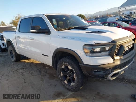 ✅ 2022 Ram 1500 Rebel • VIN: 1C6SRFLT4NN282636 • Лот: 43881798. Опубликован ранее на IAAI с пробегом 38 884 миль. Бесплатный доступ к архиву аукционных продаж из США и подробный отчёт об истории автомобиля на DreamBid. Изображение 1.
