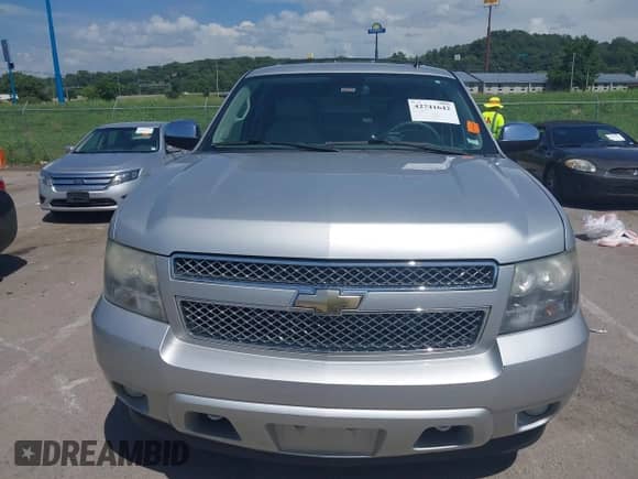 2011 Chevrolet Tahoe LTZ with VIN 1GNSKCE03BR368837, listed as a IAAI auction lot 42741642 with 166,196 mi miles and . Bid and sale history available at DreamBid. Image 12.