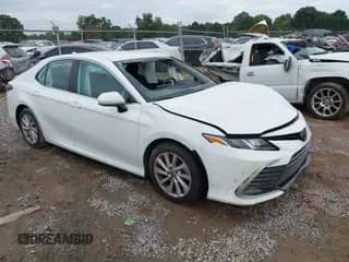 2023 Toyota Camry LE with VIN 4T1C11AKXPU770849, listed as a IAAI auction lot 43338006 with 64,765 mi miles and . Bid and sale history available at DreamBid. Image 1.