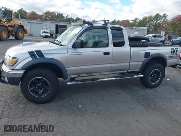 ✅ 2003 Toyota Tacoma PreRunner • VIN: 5TESM92N13Z189238 • Lot: 43584244. Listed on IAAI with 164,479 mi. Free auction sales archive from the USA and detailed vehicle history report at DreamBid. Image 14.