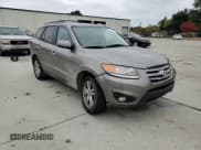 ✅ 2012 Hyundai Santa Fe Limited • VIN: 5XYZK3AB8CG143621 • Lot: 77982534. Listed on Copart with 130,010 mi. Free auction sales archive from the USA and detailed vehicle history report at DreamBid. Image 11.