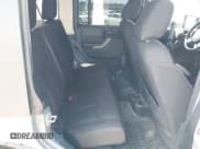 ✅ 2015 Jeep Wrangler Unlimited Sport • VIN: 1C4BJWDG1FL662600 • Lot: 43076009. Wystawiony na IAAI z przebiegiem 156 918 mil. Bezpłatny archiwum sprzedaży aukcyjnych z USA i szczegółowy raport historii pojazdu na DreamBid. Zdjęcie 8.