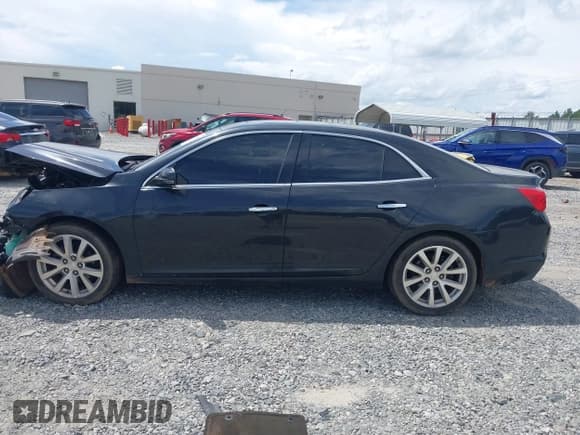 ✅ 2013 Chevrolet Malibu LTZ • VIN: 1G11H5SA6DF190026 • Lot: 42984401. Listed on IAAI with Not provided. Free auction sales archive from the USA and detailed vehicle history report at DreamBid. Image 14.