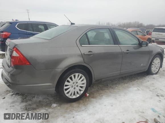 ✅ 2011 Ford Fusion Hybrid • VIN: 3FADP0L30BR198252 • Lot: 85644784. Listed on Copart with 111,528 mi. Free auction sales archive from the USA and detailed vehicle history report at DreamBid. Image 3.