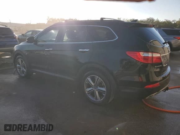 ✅ 2015 Hyundai Santa Fe Limited • VIN: KM8SN4HF4FU117653 • Лот: 79588874. Опубликован ранее на Copart с пробегом Не указан. Бесплатный доступ к архиву аукционных продаж из США и подробный отчёт об истории автомобиля на DreamBid. Изображение 2.