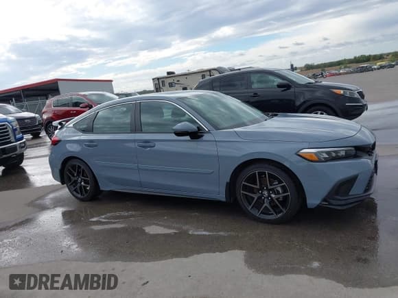 ✅ 2024 Honda Civic Sport Touring • VIN: 19XFL1G88RE011755 • Lot: 43459157. Listed on IAAI with 5,597 mi. Free auction sales archive from the USA and detailed vehicle history report at DreamBid. Image 13.