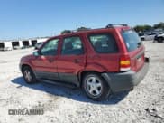 ✅ 2003 Ford Escape XLS Popular • VIN: 1FMCU92133KC25951 • Lot: 82310665. Listed on Copart with 282,034 mi. Free auction sales archive from the USA and detailed vehicle history report at DreamBid. Image 2.
