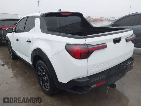 2022 Hyundai Santa Cruz SEL с VIN 5NTJBDAE5NH031398, выставлен на аукционе IAAI как лот 41449527 с пробегом 97 537 миль миль и . История ставок и продаж доступна на DreamBid. Изображение 3.