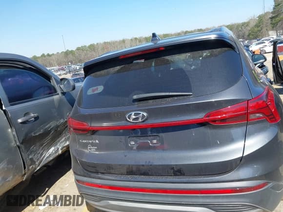 ✅ 2022 Hyundai Santa Fe SE • VIN: 5NMS14AJ4NH376650 • Lot: 41781788. Listed on IAAI with 27,253 mi. Free auction sales archive from the USA and detailed vehicle history report at DreamBid. Image 15.