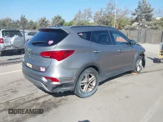 ✅ 2018 Hyundai Santa Fe 2.4L • VIN: 5NMZU3LB0JH053275 • Лот: 43396440. Опубликован ранее на IAAI с пробегом 82 932 миль. Бесплатный доступ к архиву аукционных продаж из США и подробный отчёт об истории автомобиля на DreamBid. Изображение 4.