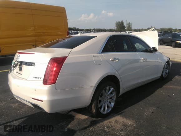 ✅ 2014 Cadillac CTS RWD • VIN: 1G6AP5SXXE0180377 • Лот: 41940004. Опубликован ранее на IAAI с пробегом 87 419 миль. Бесплатный доступ к архиву аукционных продаж из США и подробный отчёт об истории автомобиля на DreamBid. Изображение 4.