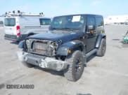 ✅ 2015 Jeep Wrangler Sport • VIN: 1C4AJWAG1FL594007 • Lot: 43779956. Listed on IAAI with 170,911 mi. Free auction sales archive from the USA and detailed vehicle history report at DreamBid. Image 2.