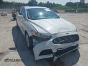 ✅ 2013 Ford Fusion Titanium • VIN: 3FA6P0SU0DR239890 • Lot: 42745530. Wystawiony na IAAI z przebiegiem 129 458 mil. Bezpłatny archiwum sprzedaży aukcyjnych z USA i szczegółowy raport historii pojazdu na DreamBid. Zdjęcie 6.