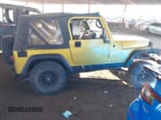 ✅ 2000 Jeep Wrangler Sport • VIN: 1J4FA49S8YP769006 • Lot: 43480409. Wystawiony na IAAI z przebiegiem Nie podano. Bezpłatny archiwum sprzedaży aukcyjnych z USA i szczegółowy raport historii pojazdu na DreamBid. Zdjęcie 13.