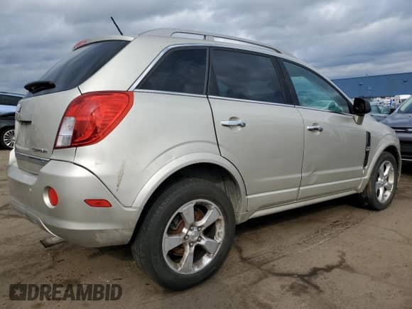 2014 Chevrolet Captiva Sport LT z VIN 3GNAL3EKXES623074, wystawiony jako Copart lot #79483184 z przebiegiem 183 055 mil mil oraz Czysty tytuł • Clean title. Historia ofert i sprzedaży dostępna na DreamBid. Obrazek 3.