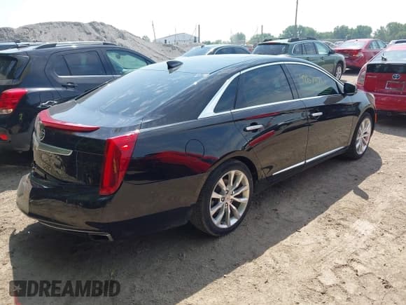 ✅ 2015 Cadillac XTS Luxury • VIN: 2G61N5S36F9125192 • Lot: 42673741. Wystawiony na IAAI z przebiegiem 122 614 mil. Bezpłatny archiwum sprzedaży aukcyjnych z USA i szczegółowy raport historii pojazdu na DreamBid. Zdjęcie 4.