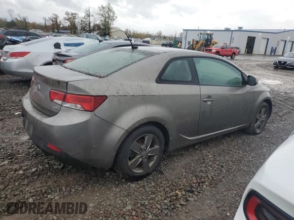 ✅ 2012 Kia Forte EX • VIN: KNAFU6A22C5480838 • Лот: 82354565. Опубликован ранее на Copart с пробегом 124 267 миль. Бесплатный доступ к архиву аукционных продаж из США и подробный отчёт об истории автомобиля на DreamBid. Изображение 3.