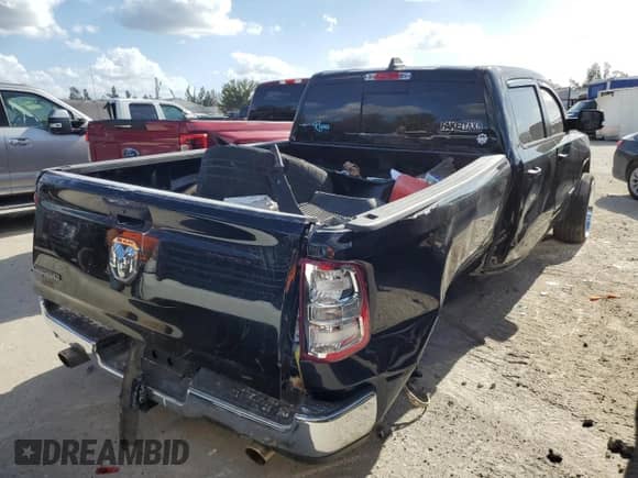 2023 Ram 1500 Lone Star with VIN 1C6RREMT8PN565793, listed as a Copart auction lot 77084184 with 18,825 mi miles and Salvage title. Bid and sale history available at DreamBid. Image 3.