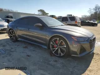 ✅ 2022 Audi RS 7 • VIN: WUAPCBF22NN912345 • Лот: 41202044. Опубликован ранее на Copart с пробегом 5 076 миль. Бесплатный доступ к архиву аукционных продаж из США и подробный отчёт об истории автомобиля на DreamBid. Изображение 4.