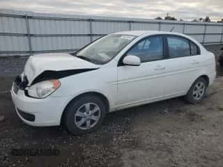 2010 Hyundai Accent GLS z VIN KMHCN4AC7AU430323, wystawiony jako Copart lot #79679514 z przebiegiem 115 579 mil mil oraz Szkoda całkowita • Salvage title. Historia ofert i sprzedaży dostępna na DreamBid. Obrazek 1.