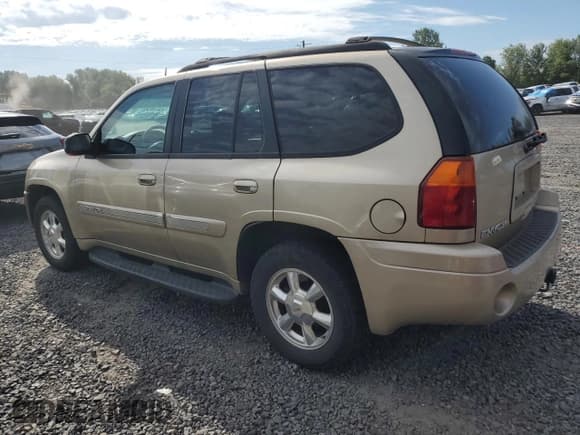 ✅ 2005 GMC Envoy SLT • VIN: 1GKDS13S552135280 • Lot: 68097344. Wystawiony na Copart z przebiegiem 165 924 mil. Bezpłatny archiwum sprzedaży aukcyjnych z USA i szczegółowy raport historii pojazdu na DreamBid. Zdjęcie 2.
