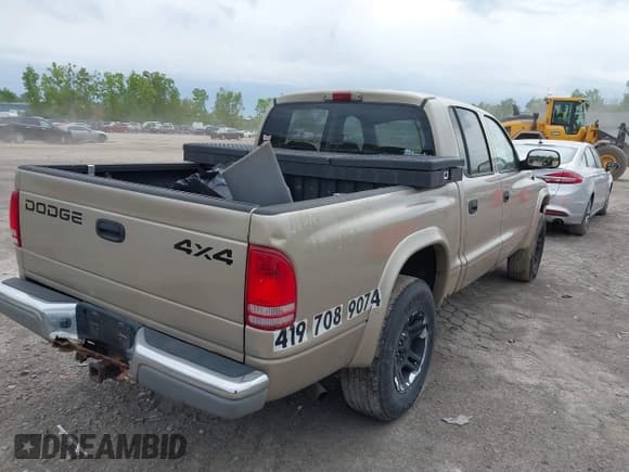 ✅ 2002 Dodge Dakota SLT • VIN: 1B7HG48N32S721409 • Lot: 42295499. Wystawiony na IAAI z przebiegiem 183 991 mil. Bezpłatny archiwum sprzedaży aukcyjnych z USA i szczegółowy raport historii pojazdu na DreamBid. Zdjęcie 4.