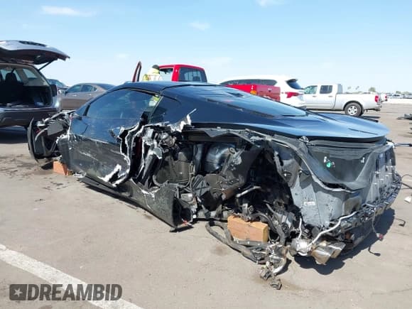 ✅ 2023 Chevrolet Corvette 2LT • VIN: 1G1YB2D47P5133477 • Lot: 42494815. Listed on IAAI with 16,904 mi. Free auction sales archive from the USA and detailed vehicle history report at DreamBid. Image 3.
