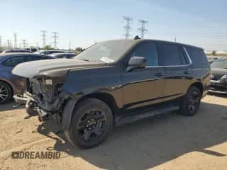 2024 Chevrolet Tahoe Commercial z VIN 1GNSKLEDXRR297326, wystawiony jako Copart lot #81322045 z przebiegiem 16 786 mil mil oraz Szkoda całkowita • Salvage title. Historia ofert i sprzedaży dostępna na DreamBid. Obrazek 1.