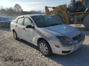 ✅ 2005 Ford Focus S • VIN: 1FAFP34N05W169006 • Lot: 92454825. Listed on Copart with Not provided. Free auction sales archive from the USA and detailed vehicle history report at DreamBid. Image 4.