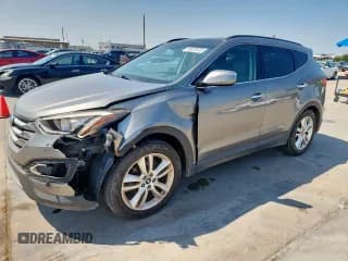 ✅ 2015 Hyundai Santa Fe • VIN: 5XYZW4LA3FG239210 • Lot: 80222675. Listed on Copart with 133,150 mi. Free auction sales archive from the USA and detailed vehicle history report at DreamBid. Image 1.