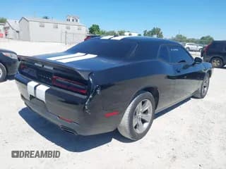 ✅ 2016 Dodge Challenger SXT • VIN: 2C3CDZAG4GH157638 • Lot: 43084001. Listed on IAAI with 163,658 mi. Free auction sales archive from the USA and detailed vehicle history report at DreamBid. Image 4.