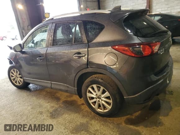 ✅ 2014 Mazda CX-5 Touring • VIN: JM3KE4CY2E0301693 • Lot: 85407885. Wystawiony na Copart z przebiegiem 177 738 mil. Bezpłatny archiwum sprzedaży aukcyjnych z USA i szczegółowy raport historii pojazdu na DreamBid. Zdjęcie 2.