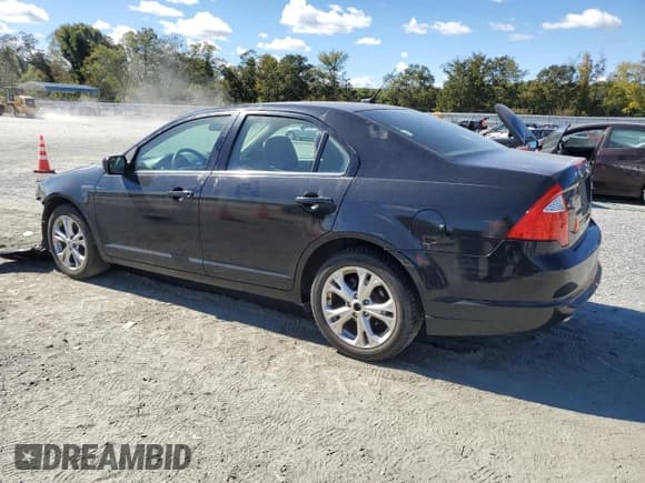 ✅ 2012 Ford Fusion SE • VIN: 3FAHP0HG8CR188082 • Lot: 86168675. Wystawiony na Copart z przebiegiem 162 893 mil. Bezpłatny archiwum sprzedaży aukcyjnych z USA i szczegółowy raport historii pojazdu na DreamBid. Zdjęcie 2.