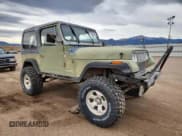 ✅ 1987 Jeep Wrangler • VIN: 2BCCV8143HB520719 • Lot: 92108075. Wystawiony na Copart z przebiegiem 198 485 mil. Bezpłatny archiwum sprzedaży aukcyjnych z USA i szczegółowy raport historii pojazdu na DreamBid. Zdjęcie 4.