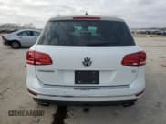 ✅ 2016 Volkswagen Touareg Sport • VIN: WVGEF9BP9GD005988 • Lot: 87360354. Listed on Copart with 93,435 mi. Free auction sales archive from the USA and detailed vehicle history report at DreamBid. Image 6.